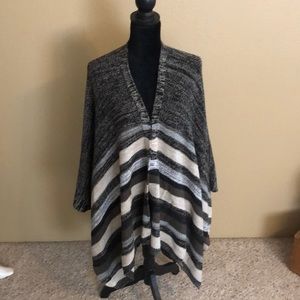 Gift never worn. Too big